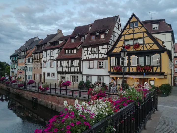 Folklore dancing in the evening at Colmar, Alsace (France)